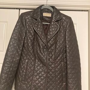 Michael Kors genuine leather quilted jacket.